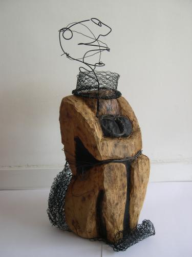 2010 - La Brésilienne | Matériaux : Bois de Chêne, Fil de fer et Grillage | Techniques : Taille directe | Dimensions : 70 x 33 x 31 cm | Poids : 11 kg