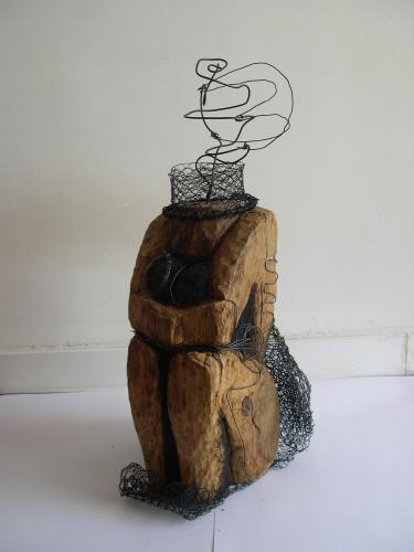 2010 - La Brésilienne | Matériaux : Bois de Chêne, Fil de fer et Grillage | Techniques : Taille directe | Dimensions : 70 x 33 x 31 cm | Poids : 11 kg